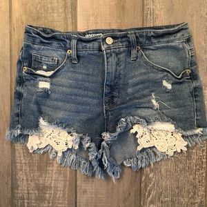 Mossimo distressed jean shorts with lace detail